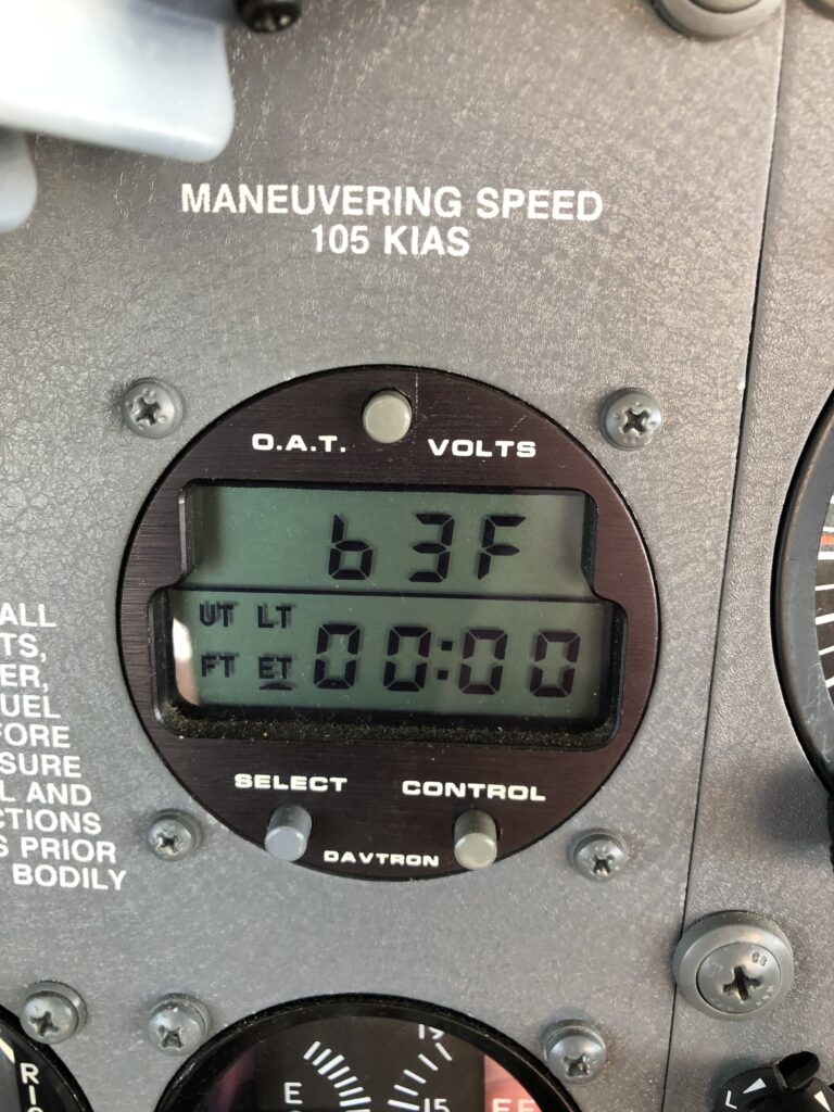 Outside air temperature gauge, displaying 63 degrees F.